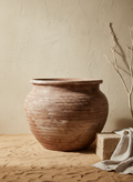 Rustic Brown Terracotta Planter with Rounded Body and Textured Finish